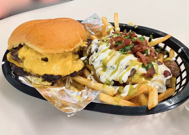 Image: A double smash burger and carne asada fries and Pacheco Taco N Burger.