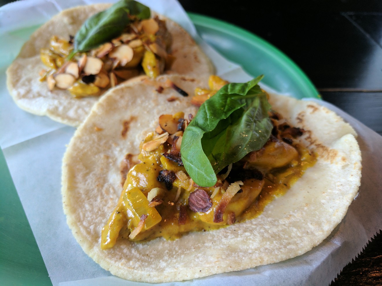 The Kermit in Bangkok taco at Revolver Taco Lounge features housemade Thai yellow curry sauce.
