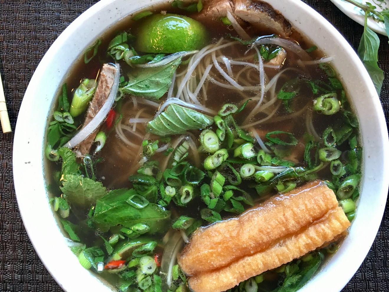 The pho with beef tenderloin is $12 at lunch and is now served in the evening as well.