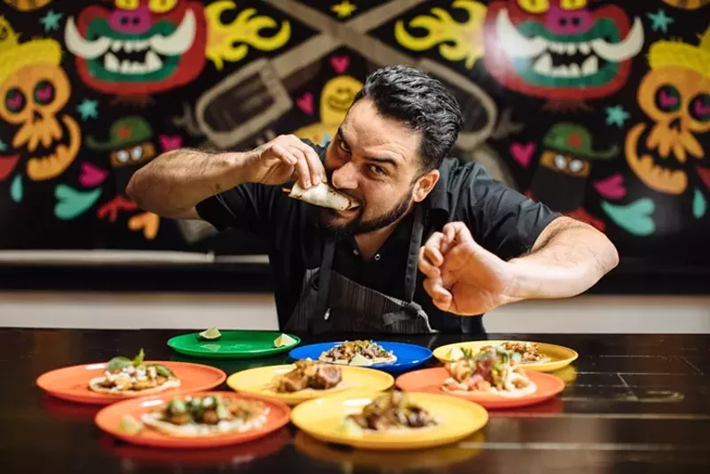 Image: Regino Rojas of Purepecha in Dallas eats a taco.