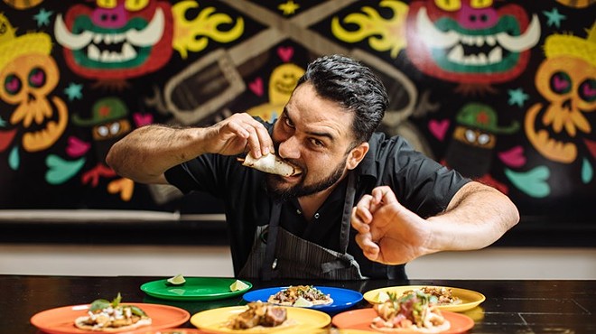 Regino Rojas of Purepecha in Dallas eats a taco.