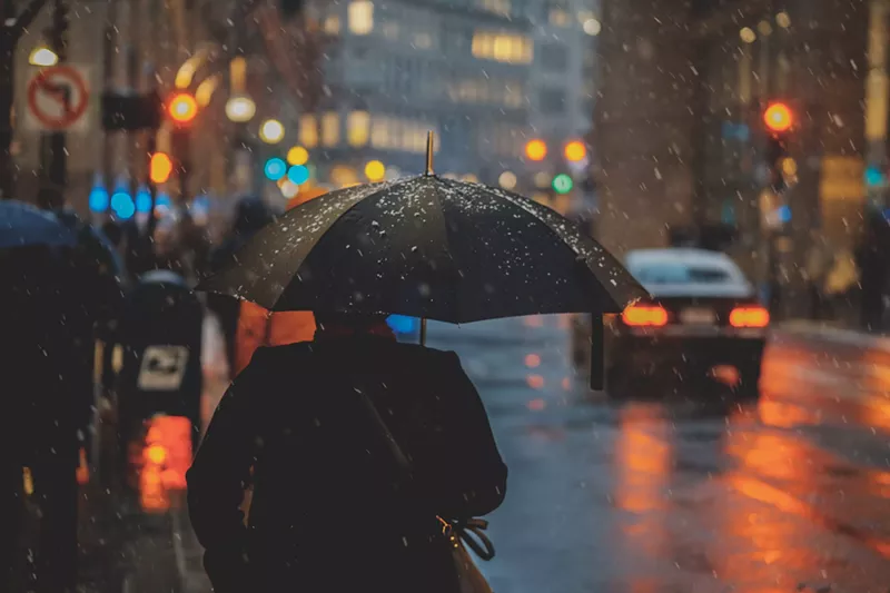 Image: rain umbrella big city cold weather