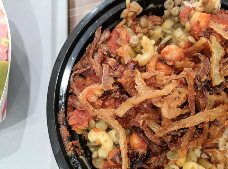 Image: Koshari is a comforting vegetarian dish made with lentils, macaroni noodles and rice, and it was the star at Mubrooka Egyptian Street Food.