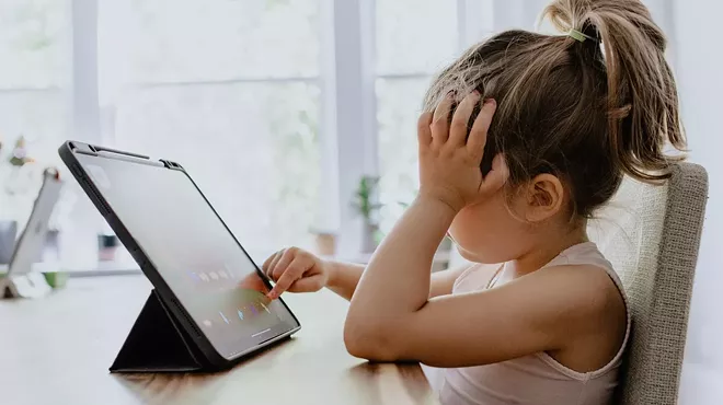kid on computer