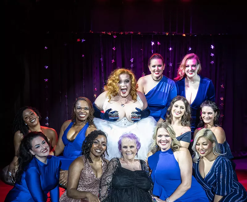 Image: Uptown Review burlesque dancers pose with their newest star: Juicy Jan, making her debut at Dallas' The Nines at age 69.