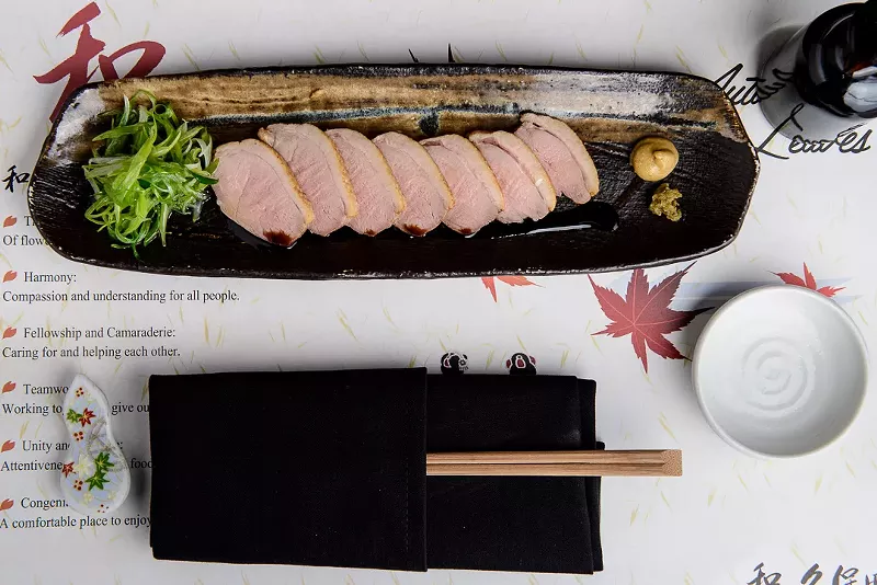 Image: Kamonegi : Japanese-style roasted duck, served chilled with a side of green onions and Japanese Karashi musturd