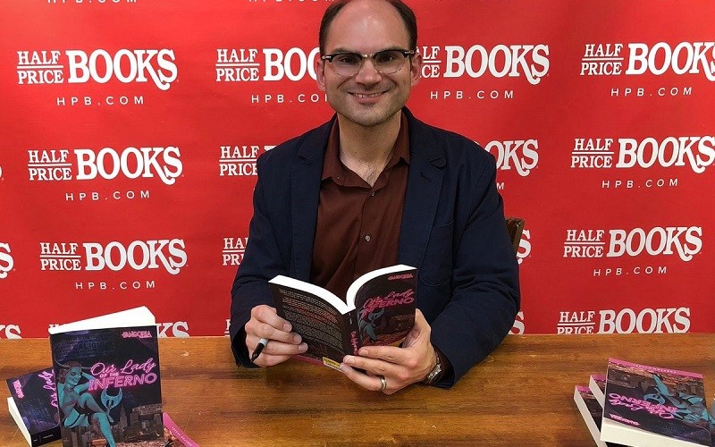 Preston Fassel at a book signing. His latest book, Necessary Death: What Horror Movies Teach Us About Navigating the Human Experience, maintains that horror is therapeutic.