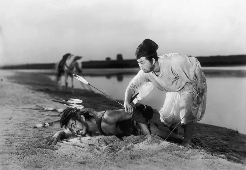 Image: Toshiro Mifune (1920 - 1997, left) and Daisuke Kato (1910 - 1975) in a fight scene from Akira Kurosawa's film Rashomon, adapted from the novel 'Inside A Bush' by Ryunosuke Akutagawa.