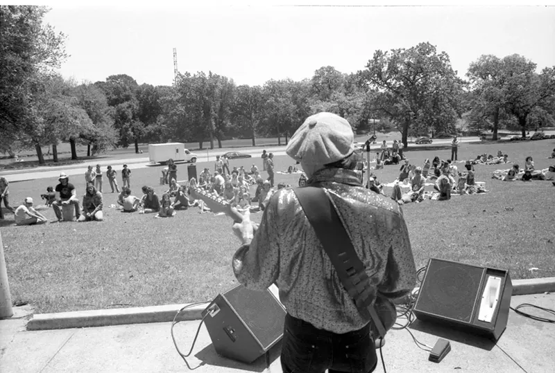 Image: Stevie Ray Vaughan, seen here playing a free concert at Dallas’ Lee Park in 1980, is the subject of a Dallas-made documentary about him and his brother Jimmie.