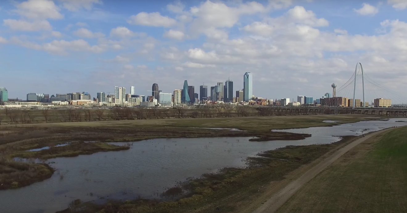 An aerial view of the Trinity river and downtown Dallas