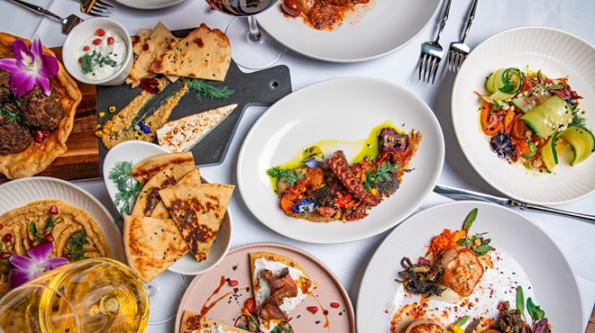 a spread of dishes at Nikki Greek