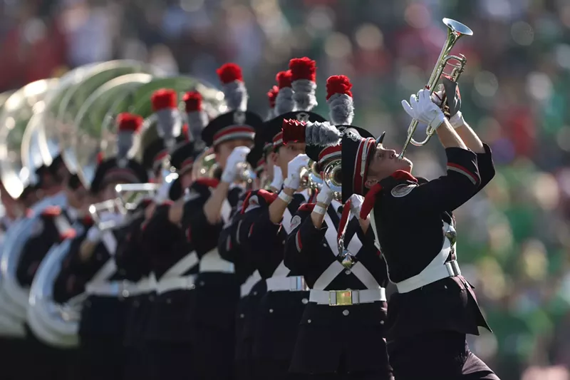 Image: Members of the Ohio State Buckeyes marching band perform before this year's Rose Bowl game against the Oregon Ducks.