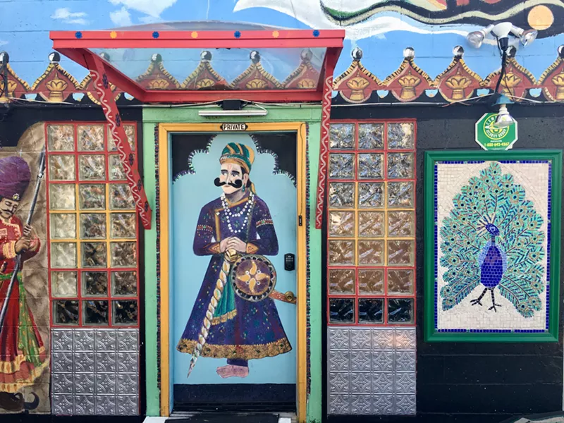 Image: The vivid art of Cosmic Cafe's parking lot.