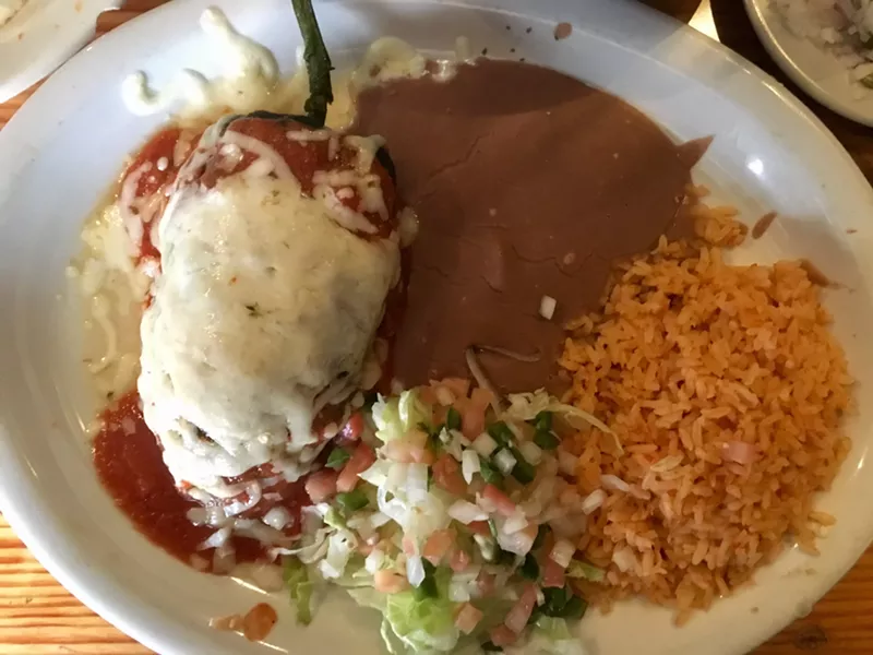 Image: The chile relleno, stuffed with brisket, is one of the best Tex-Mex dishes in the city ($12.95).