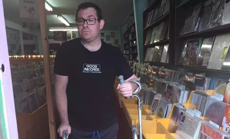 Image: Since he relearned to walk, Matthew Vickers has enjoyed making regular trips to Good Records to pick up cassettes.