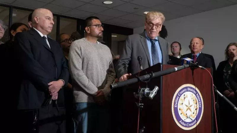 Image: Martin Santillan (left) and attorney Paul Casteleiro speak in Dallas after Santillan's March 2023 exoneration.
