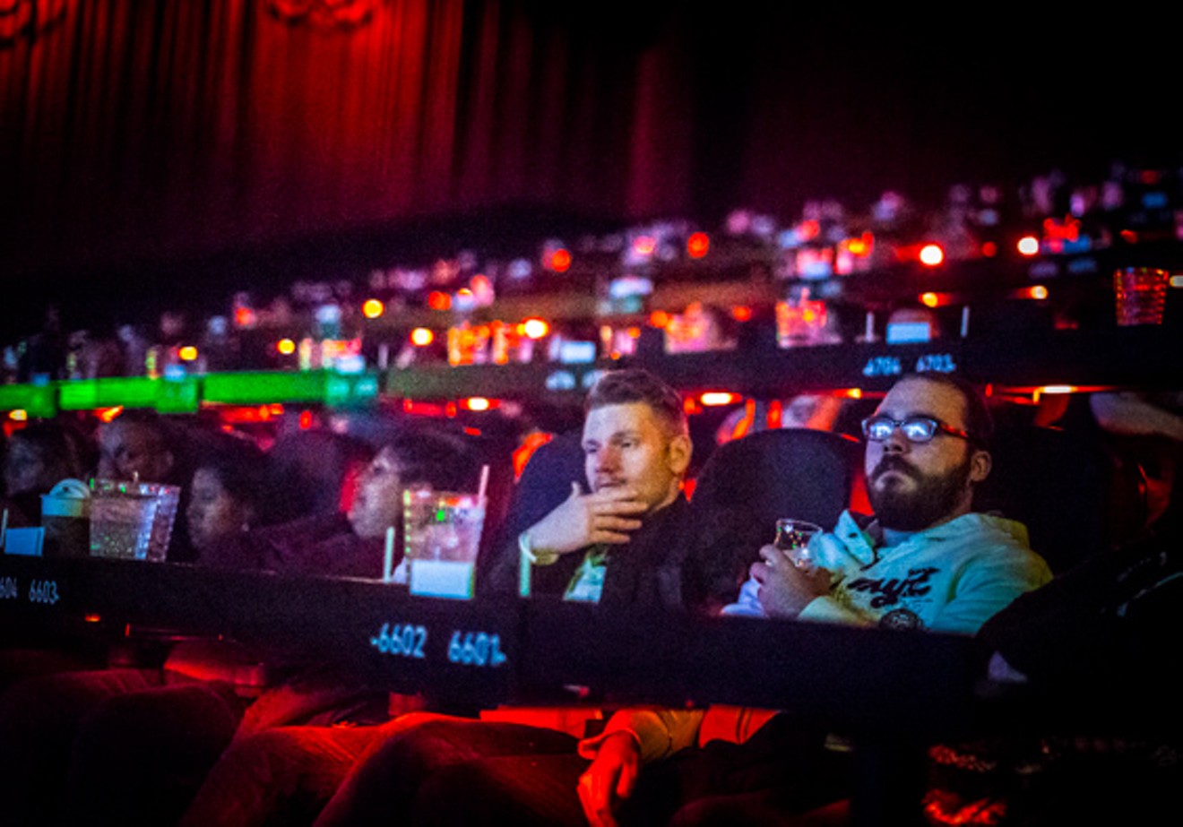 Guests at the Alamo Drafthouse Richardson watch the special previews before a screening of Peter Jackson's The Hobbit shortly after the theater's official opening in 2013.