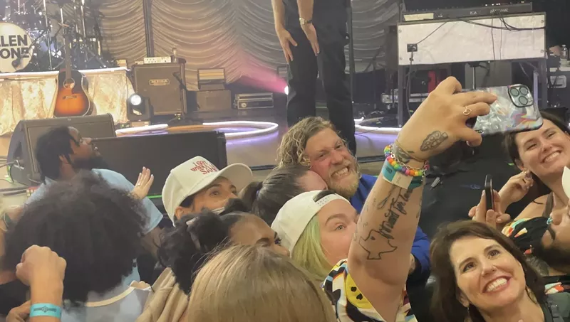 Image: Singer Allen Stone takes selfies with fans after a Dallas concert at House of Blues.