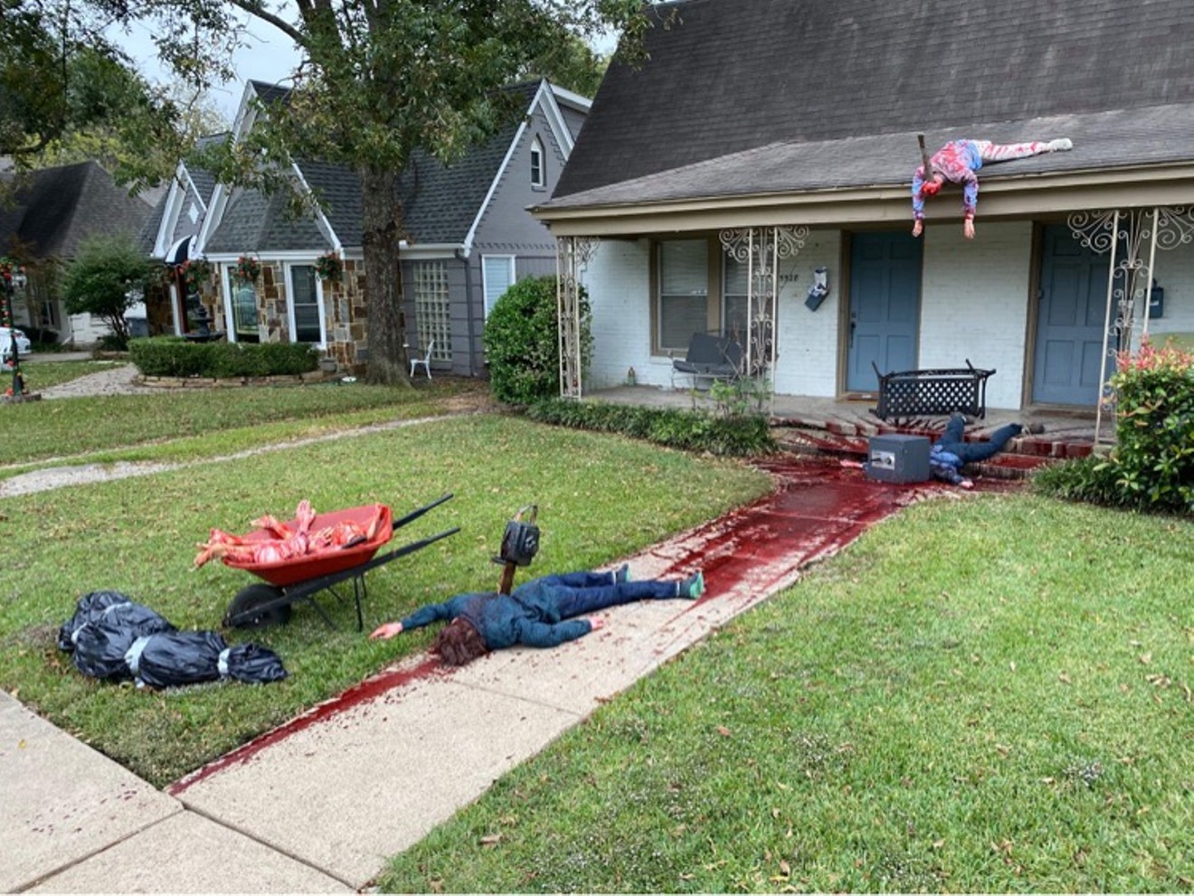 Steven Novak's crime scene Halloween decorations are so realistic that neighbors are calling the police to investigate.