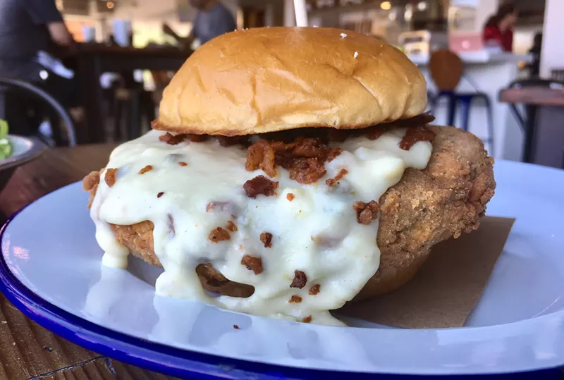 Image: The chicken-fried burger with a jalapeño-spiked cream gravy for $9.95.
