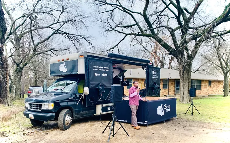 Image: Quincy Roberts of Roberts Trucking, which was hired to remove shingle mountain, is a trained opera singer and coordinated this impromptu concert for Marsha Jackson.