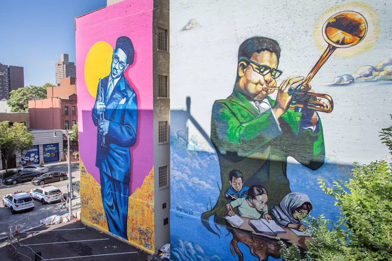 Image: Artists Brandan "Bmike" Odums from New Orleans and Marthalicia Matarrita from Harlem contributed murals of jazz legend John Birks "Dizzy" Gillespie, a Harlem icon and outspoken Baha'i.