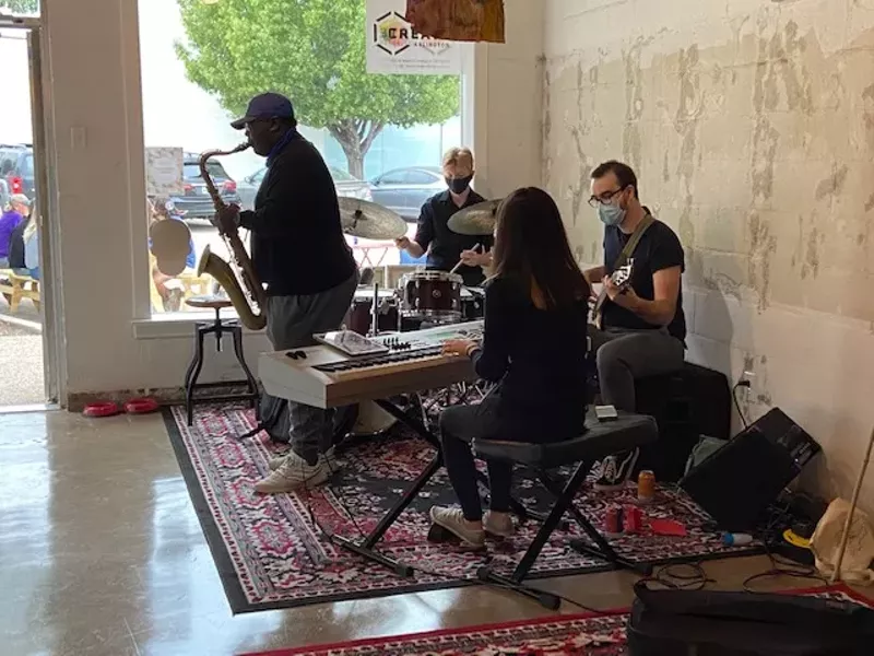 Image: Musicians jamming at Create Arlington, a new spot for artists to turn their craft into a business.