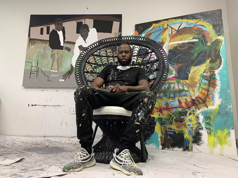 Image: Artist Jammie Holmes won't smile for photos, and matches the characters in his paintings.