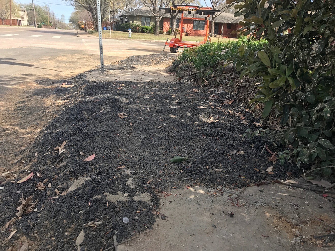 Crews replacing gas lines left behind a fast patch on Merrell Road. Atmos will be responsible for putting the streets back in order once gas service is restored to nearly 3,000 homes in Northwest Dallas.