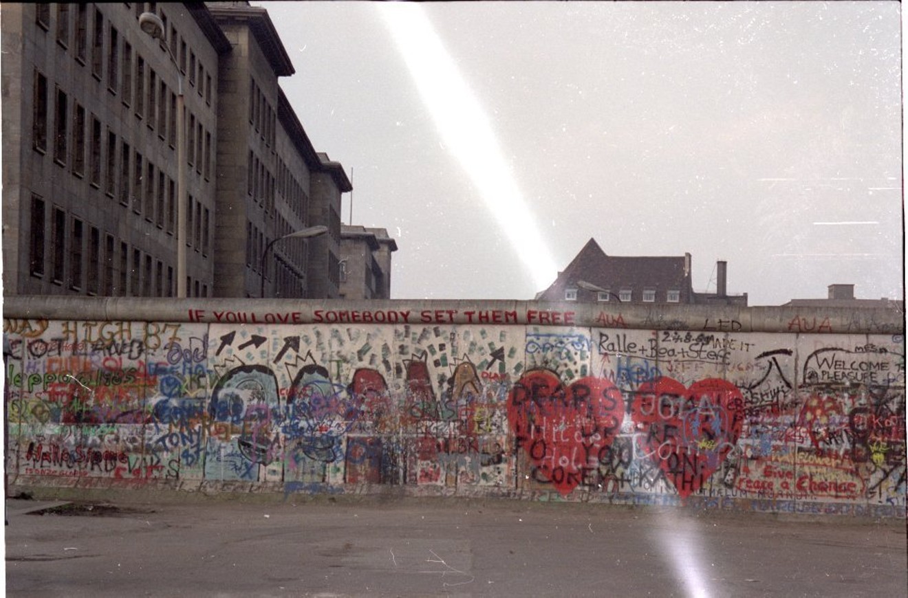 When the Berlin Wall came down, it came down  suddenly.  So will the walls of perception that separate Dallas.