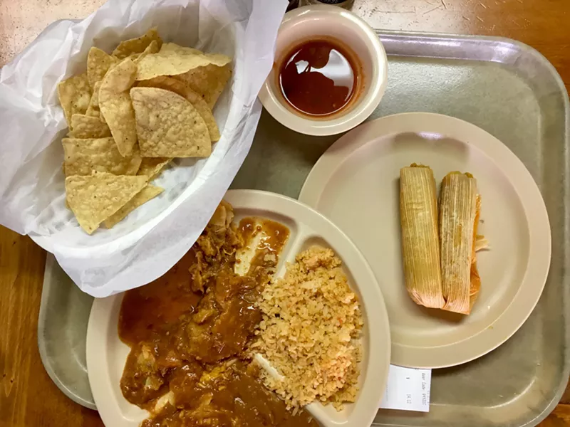 Image: Morning tamales and salsa in a paper cup at the all-you-can-eat cafeteria.