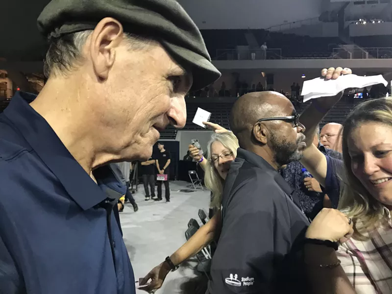 Image: James Taylor meets with fans and signs autographs after his show with Bonnie Raitt at the Ford Center at The Star in Frisco.