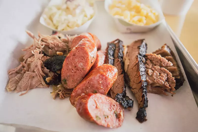 Image: Pulled pork, jalapeño sausage and brisket from Austin's Bar-B-Que are more old-school than craft style, but it makes a tasty meal that's also budget-friendly.