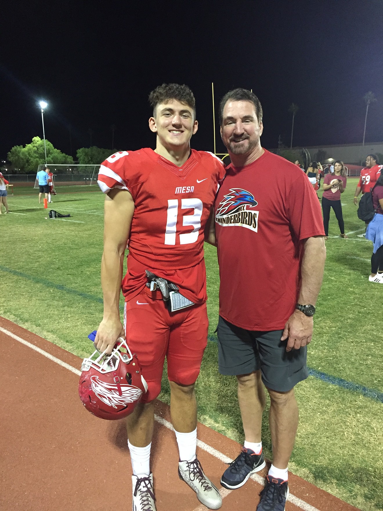 Luke Laufenberg and his father, Babe, at a Mesa Community College football game.