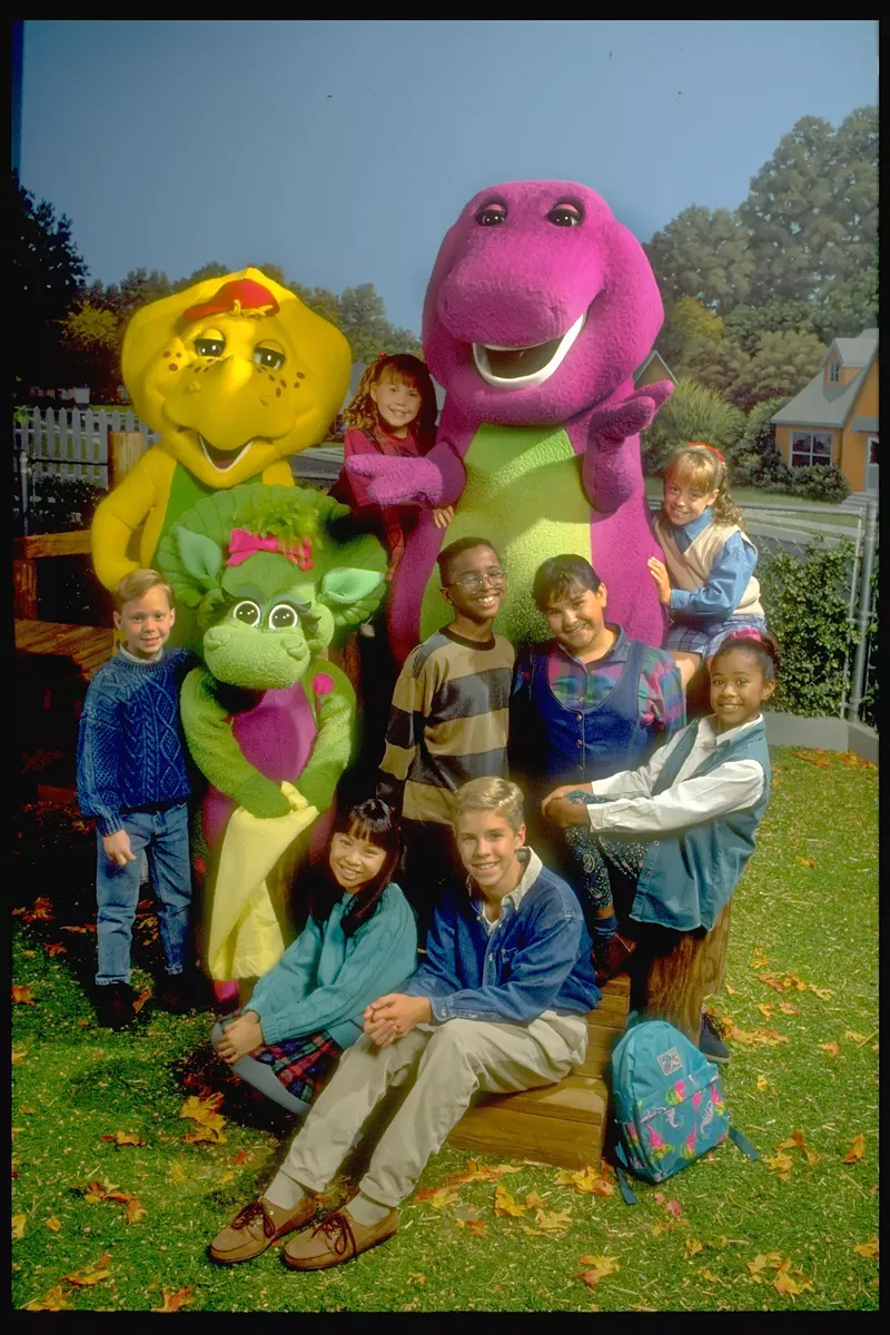 Image: A press photo from the PBS TV series Barney & Friends in the early 1990s.