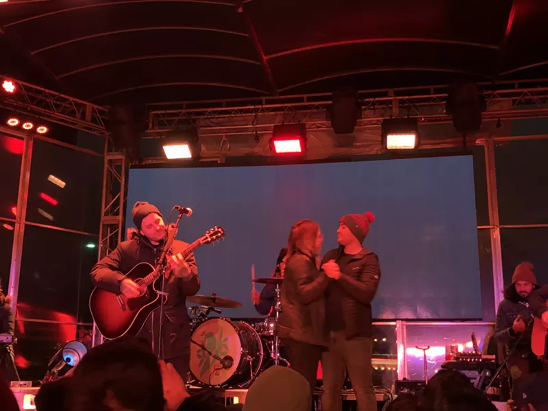 Image: Why not get engaged at an emo concert?