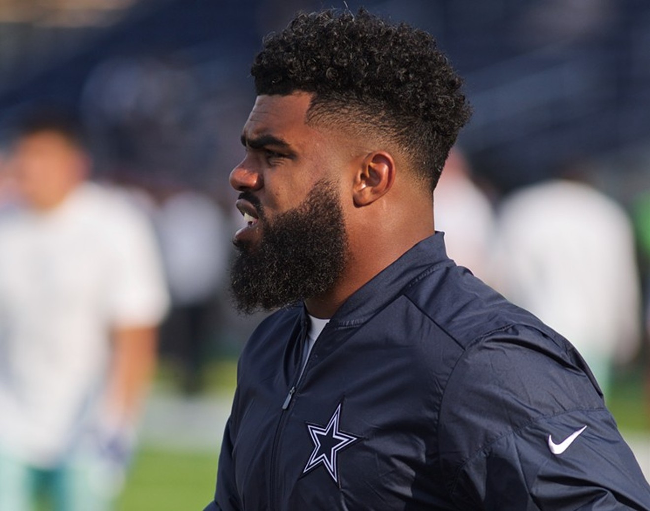 Ezekiel Elliott warms up before the Hall of Fame game between the Arizona Cardinals and the Dallas Cowboys.