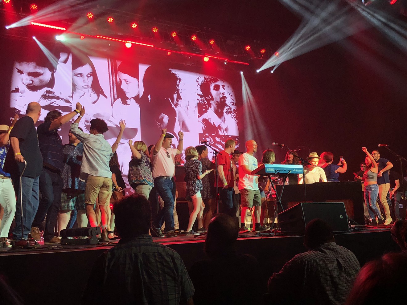 Fans joined Belle and Sebastian onstage for the band's final song.