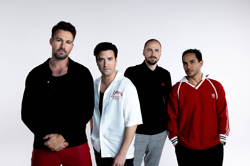 Image: Band is posing for a picture