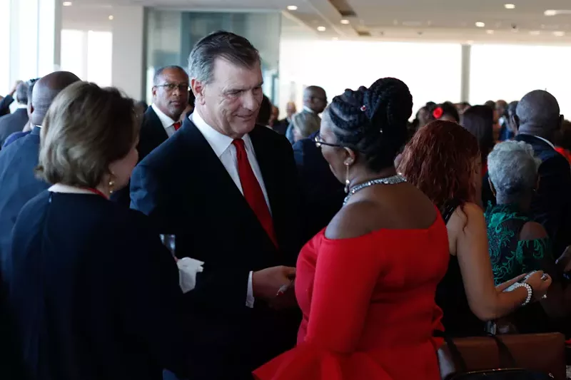 Image: Former Dallas Mayor Mike Rawlings was one of many who came to support Botham Jean's family and the new charitable foundation that shares his name.