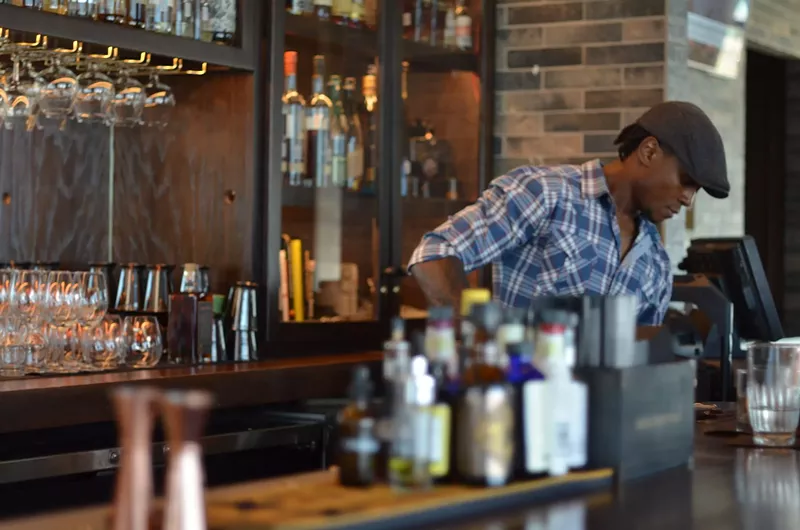 Image: Bottled in Bond owner Jasin Burt works behind the bar at this newcomer to the Frisco cocktail scene.