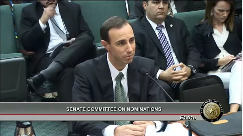 Image: Texas Secretary of State David Whitley appears at a Texas Senate hearing on Feb. 7.