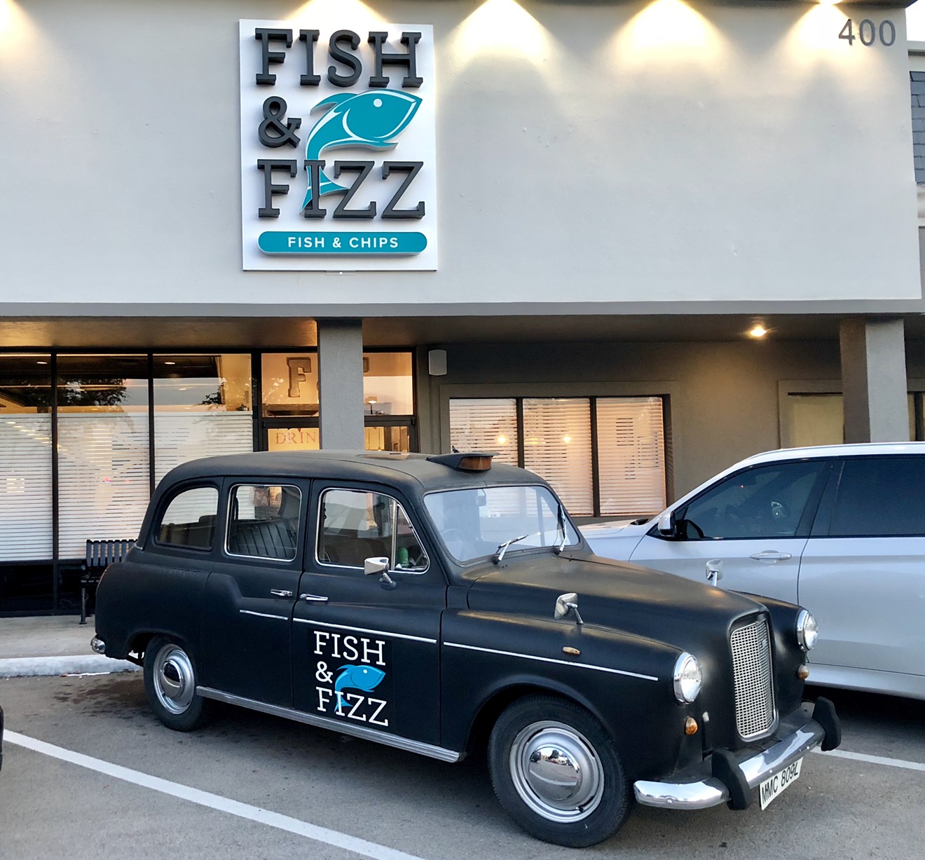 It's easy to spot Fish & Fizz with the vintage London taxi parked out front.