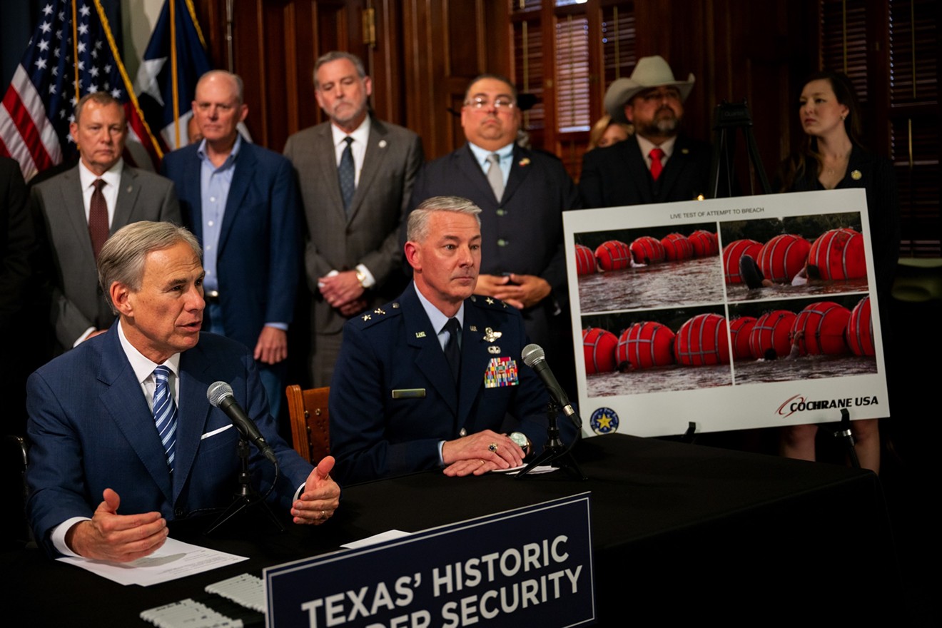 Texas Gov. Greg Abbott speaks about an illustration of new border security implementation during a news conference at the Texas State Capitol.