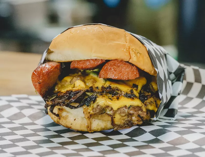 Image: The Schmurger Dog comes with a smashed beef patty, weiners, cheese, jalapenos and sauteed onions. No, you shut up!