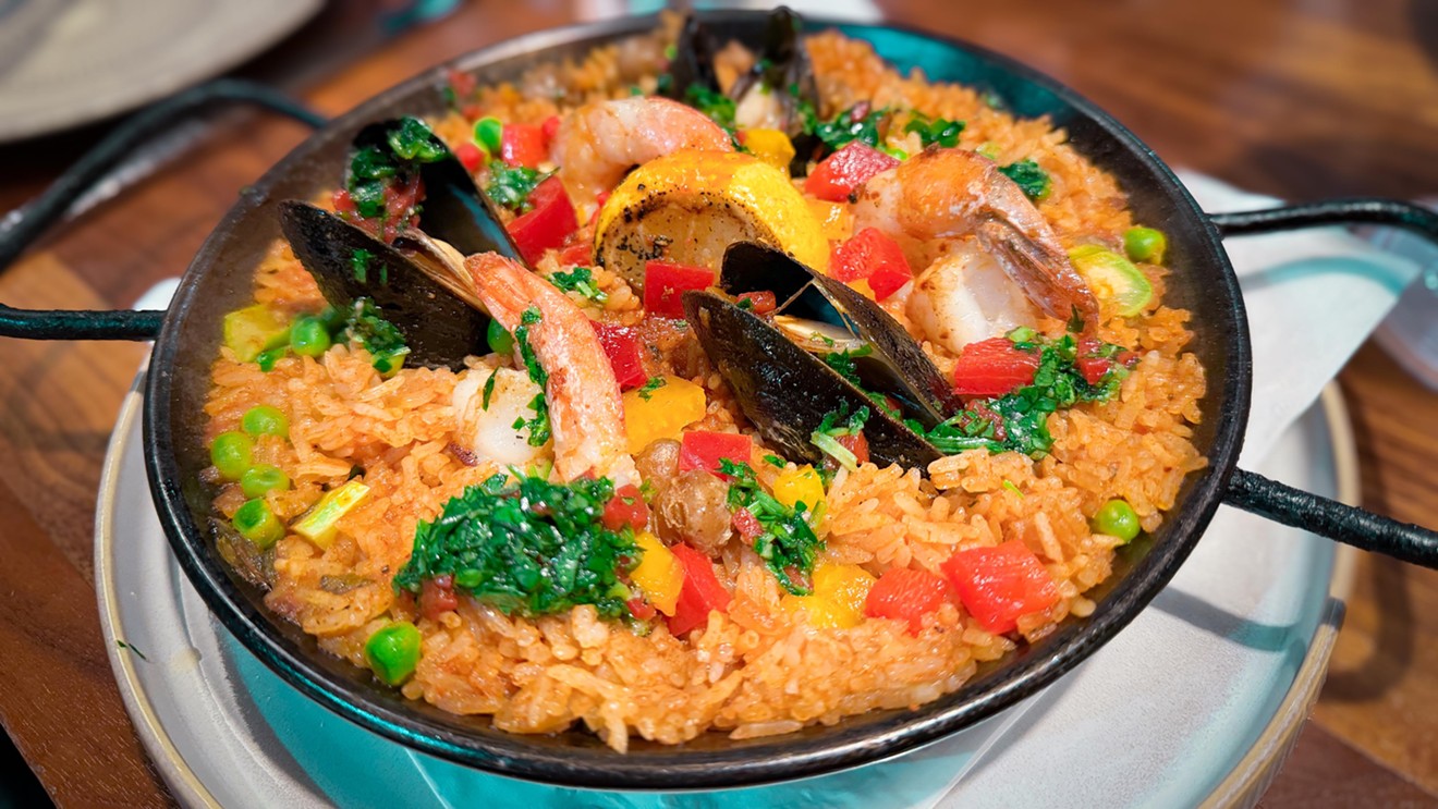 The paella is served as a side but it's enough for two.