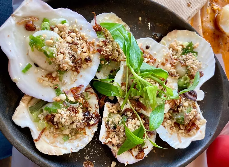 Image: Green onion oil grilled scallops at Cajun Corner