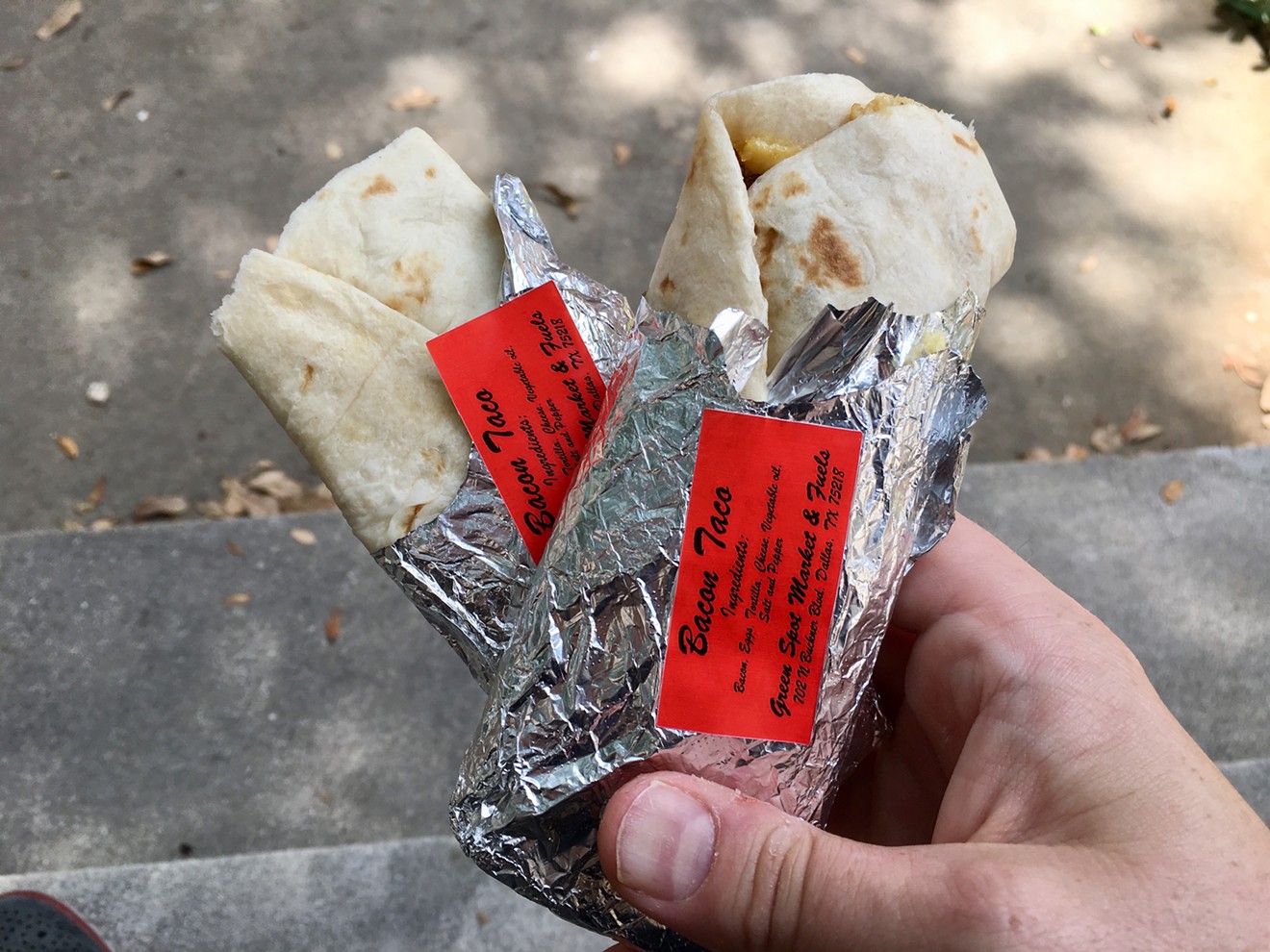 Two bacon and egg tacos ($2.75 each) to-go.