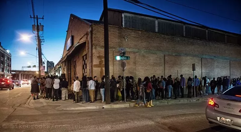 Image: A Bomb Factory queue snakes past the future home of Canton Hall.