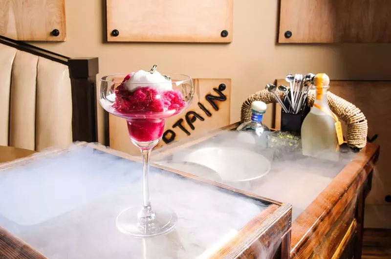 Image: This cocktail is a drink and a show.